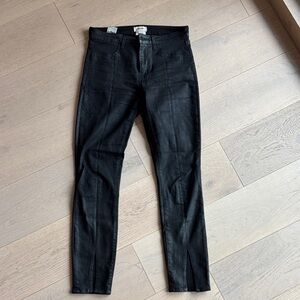 L’Agence Coated Skinny Black Jeans with Slit in front
